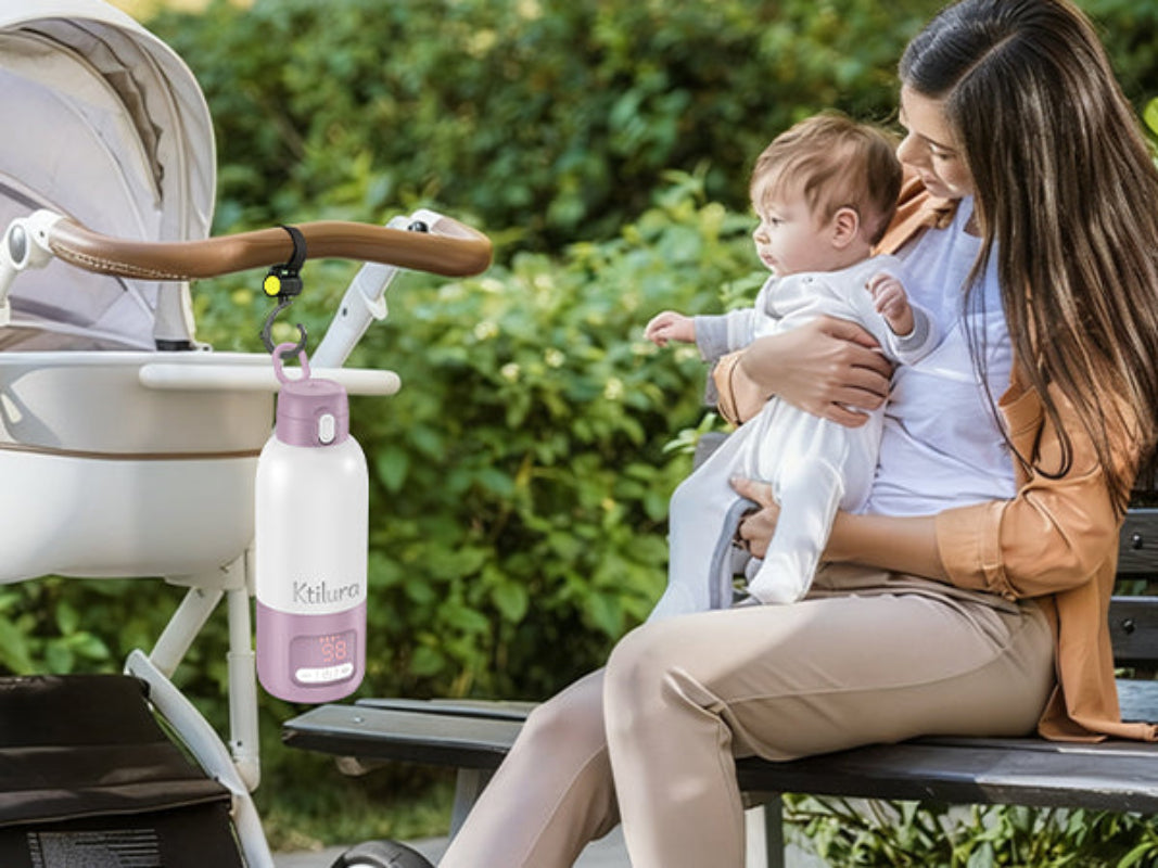 Portable bottle warmer attached to a stroller for travel